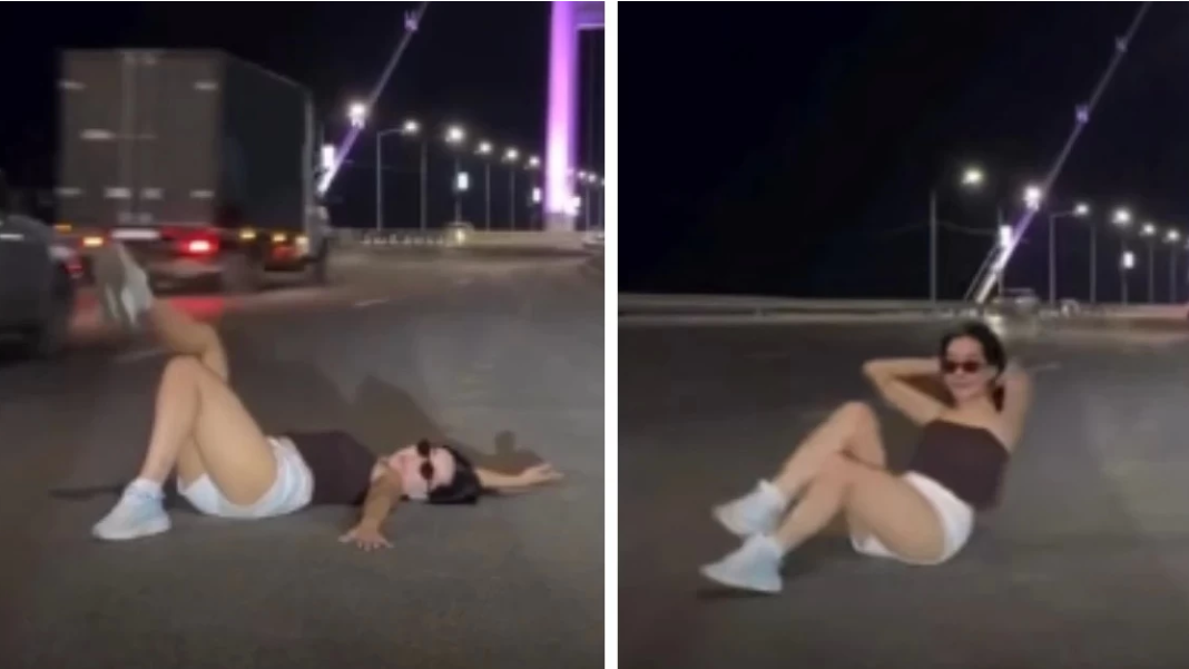 Семейде көпір үстінде жолға жатып фотоға түскен әйелге айыппұл салынды